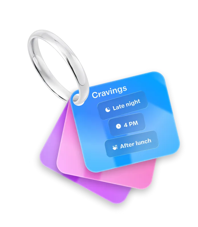 Colorful Syro cards hanging from a silver key ring, the top card listing late night, 4 PM and after lunch cravings